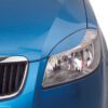 Paupières de phares avants (la paire) pour Skoda Roomster Typ 5J hatchback (2006-03/2010) - Fabriqué en ABS (à peindre)