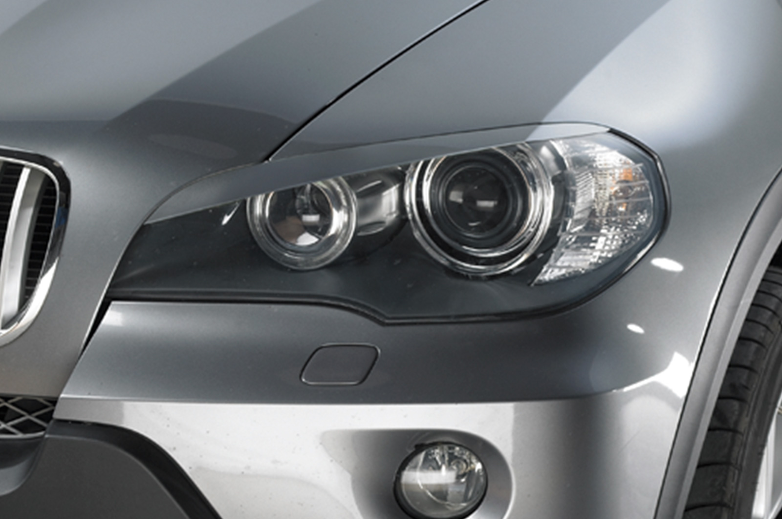Paupières de phares avants (la paire) pour BMW X5 E70 toutes carrosseries (depuis 2006) - Fabriqué en ABS (à peindre)
