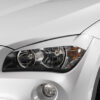 Paupières de phares avants (la paire) pour BMW X1 / E84 hatchback (2009-7/2012) - Fabriqué en ABS (à peindre)