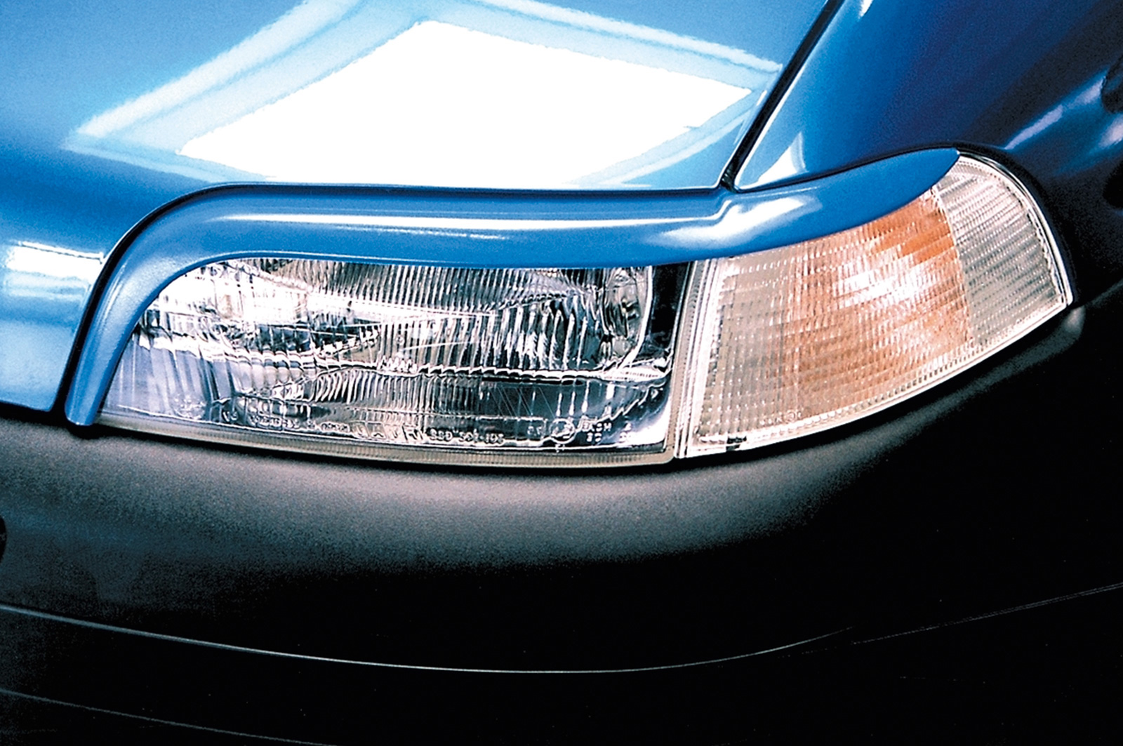 Paupières de phares avants (la paire) pour Fiat Punto 1 176 toutes carrosseries (1993-1999) - Fabriqué en ABS (à peindre)