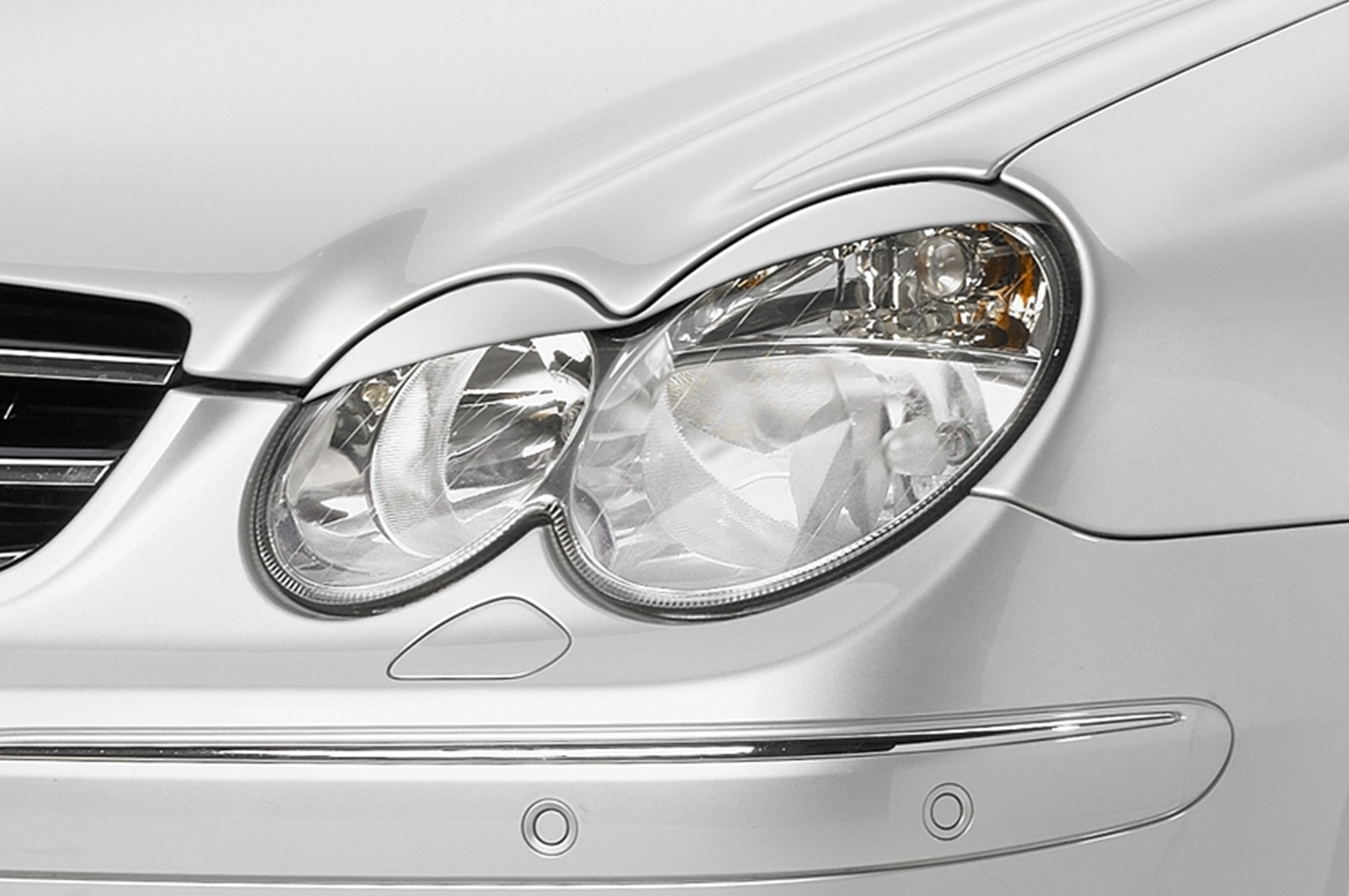 Paupières de phares avants (la paire) pour Mercedes Benz CLK 209 coupé / cabriolet (2002-2010) - Fabriqué en ABS (à peindre)